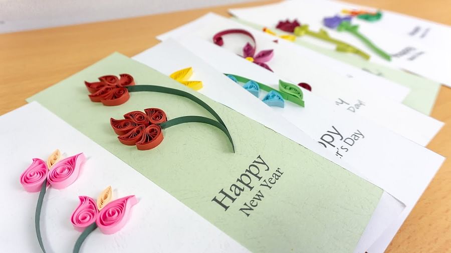 Finished quilled greeting card with step by step elements highlighted